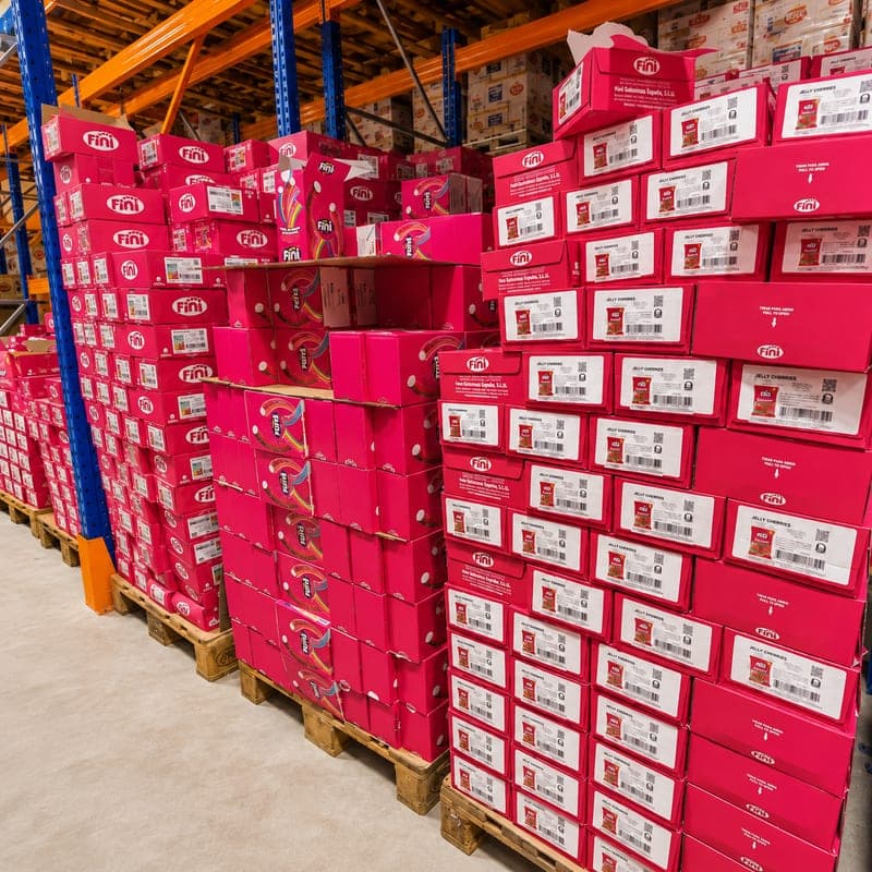 Confectionery cases arranged on pallets